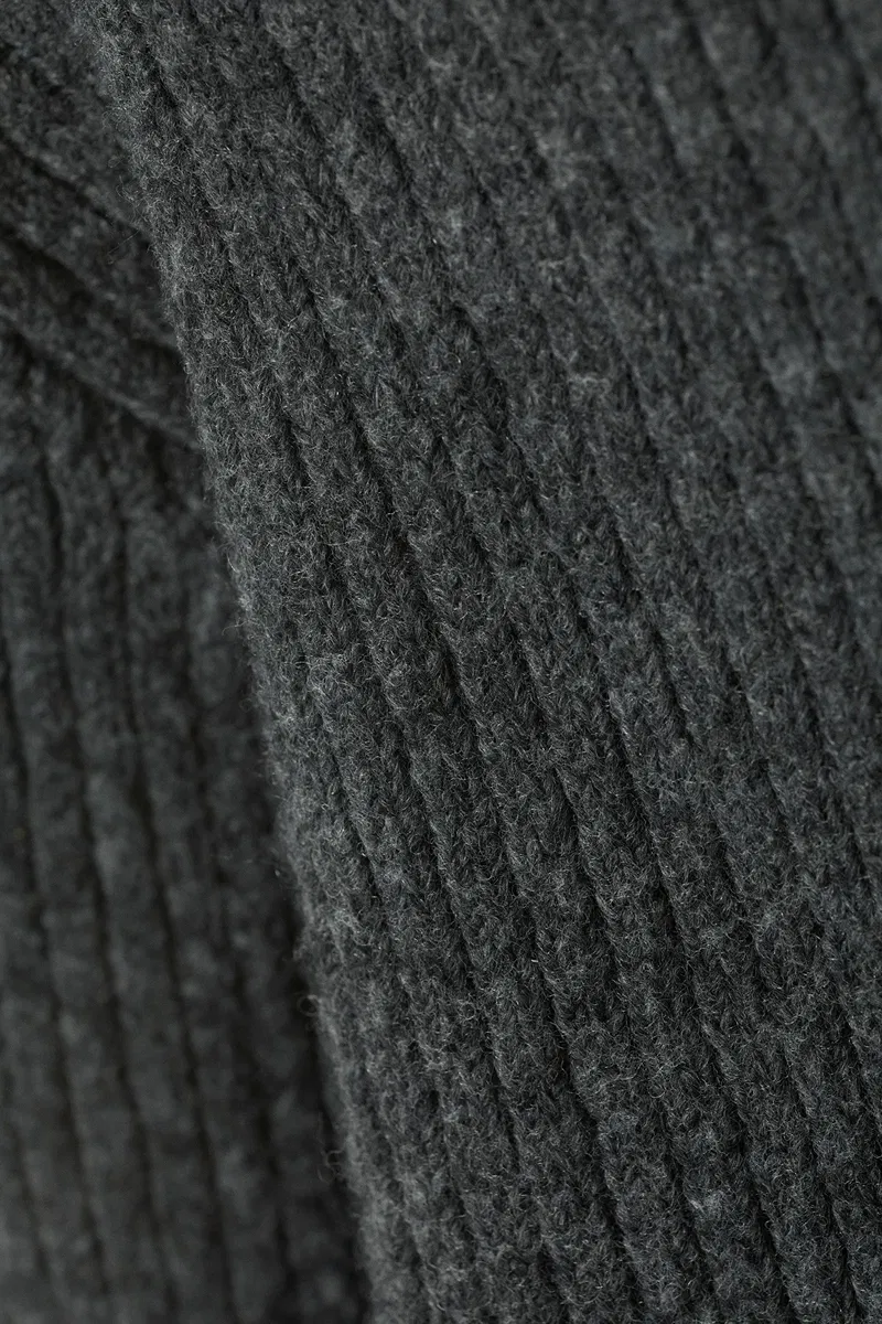 Dark gray ribbed knit sweater detail