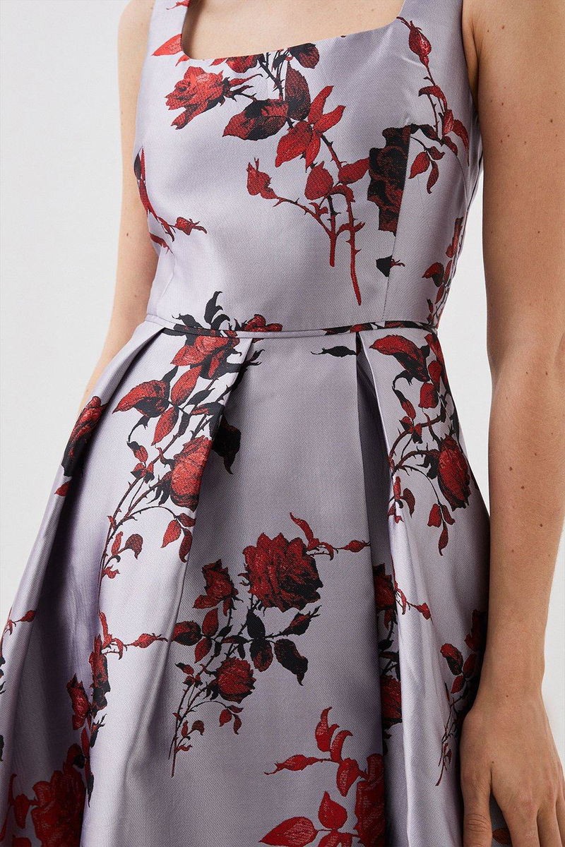 lydia millen floral jacquard corseted woven maxi dress The Textured Floral Midi Dress designed by Lydia Millen. 'A classic floral long-sleeve midi dress is the perfect piece to transition from the colder months to spring. The floral pattern brings a