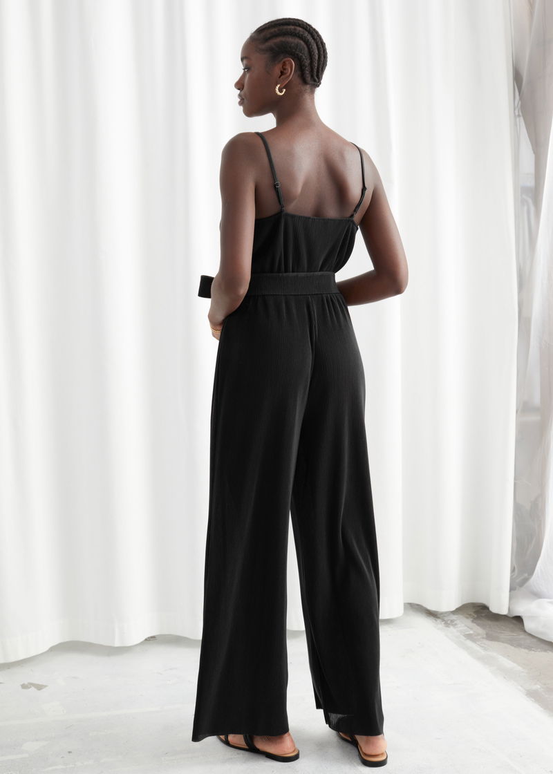 Flared velour jumpsuit with wide straps