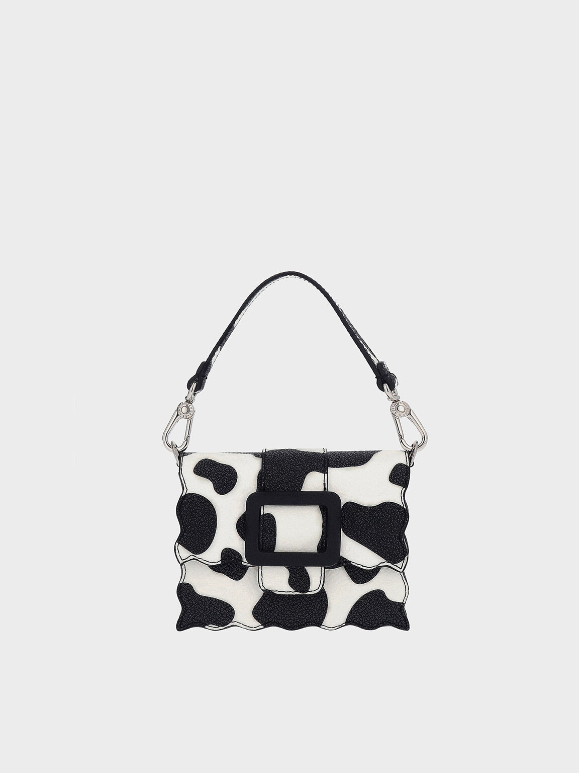 CHARLES & KEITH Waverly Cow Print ScallopTrim Mini Bag Endource