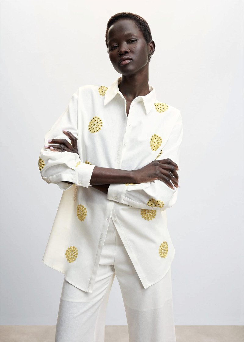 A white cropped men's shirt with Swiss embroidery