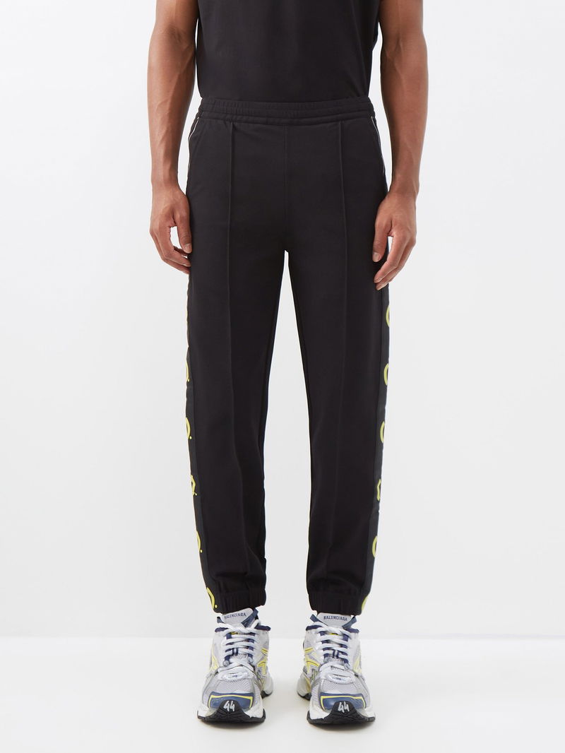 Black X (b).STROY printed twill track pants, Givenchy