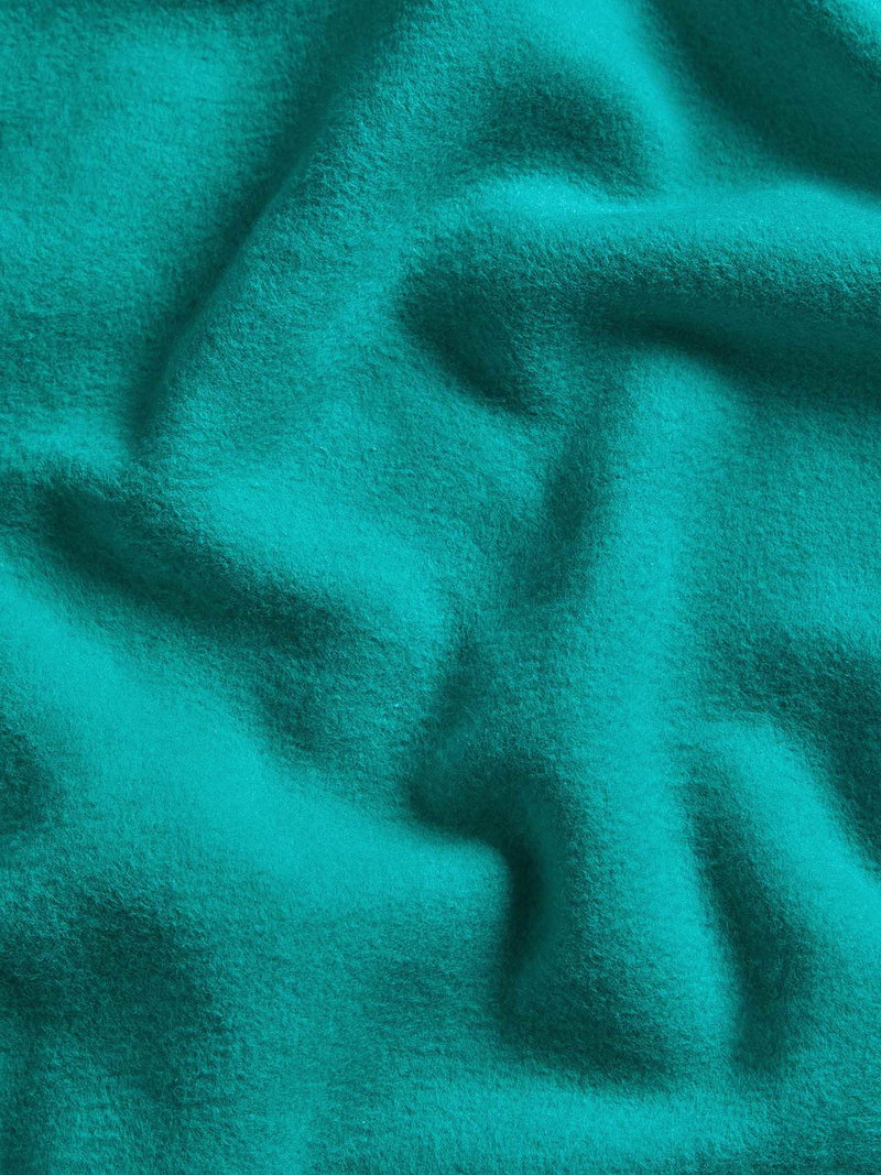 Deep teal fleece fabric texture