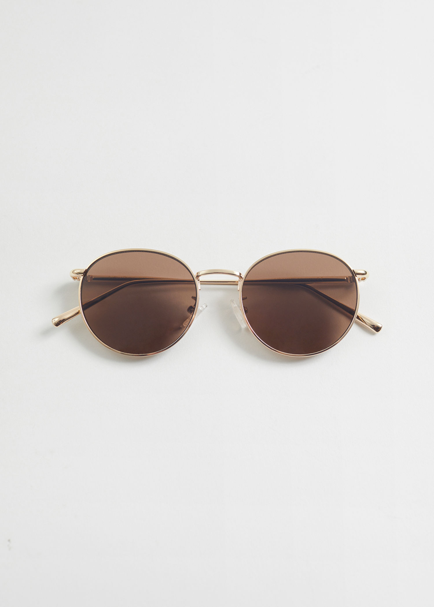 & OTHER STORIES Oval Slim Frame Sunglasses in Gold | Endource