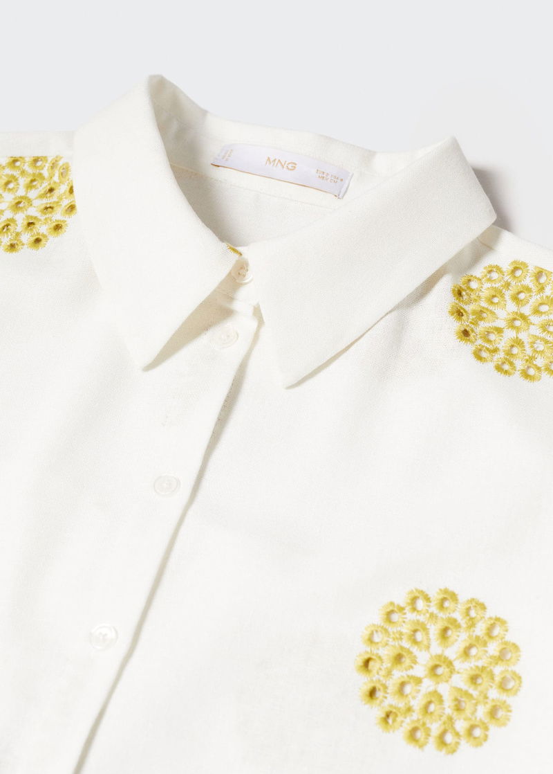 A white cropped men's shirt with Swiss embroidery