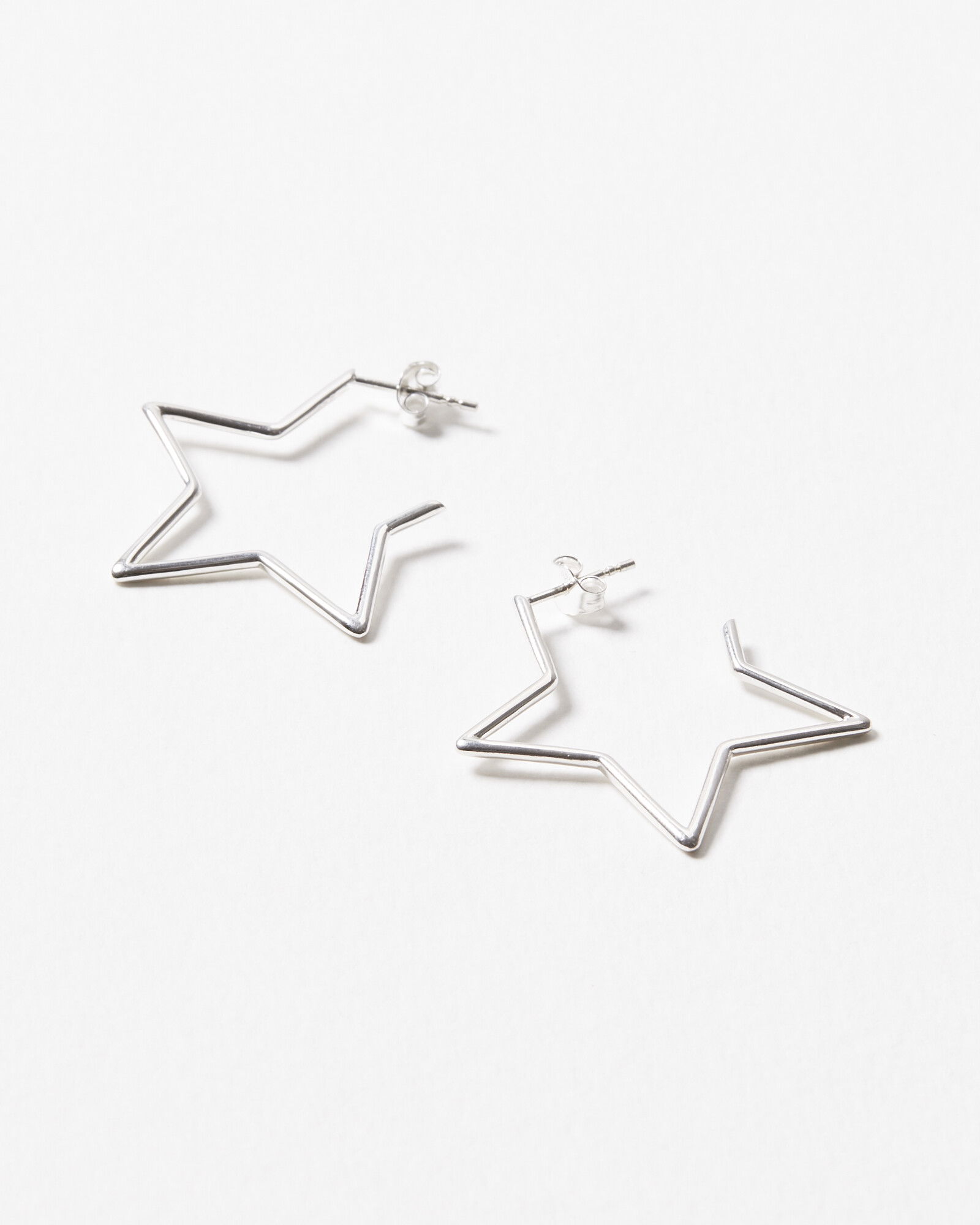 OLIVER BONAS Star Outline Hoop Earrings Large in Silver | endource
