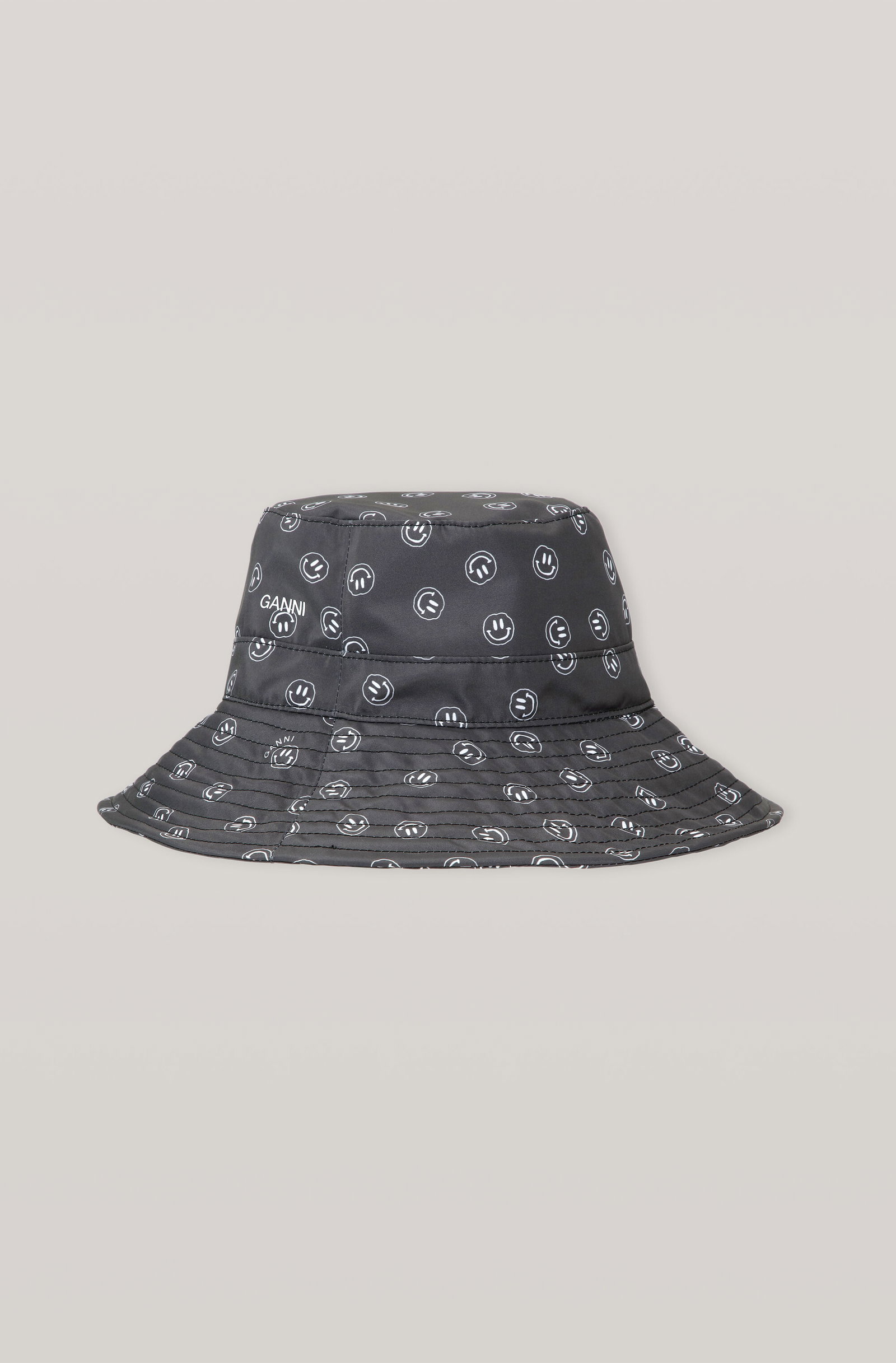 Ganni Black Smiley Face Print Tech Bucket Hat with Pink Embroidered Logo GANNI smiley face print bucket hat crafted from... | Depop main image 2