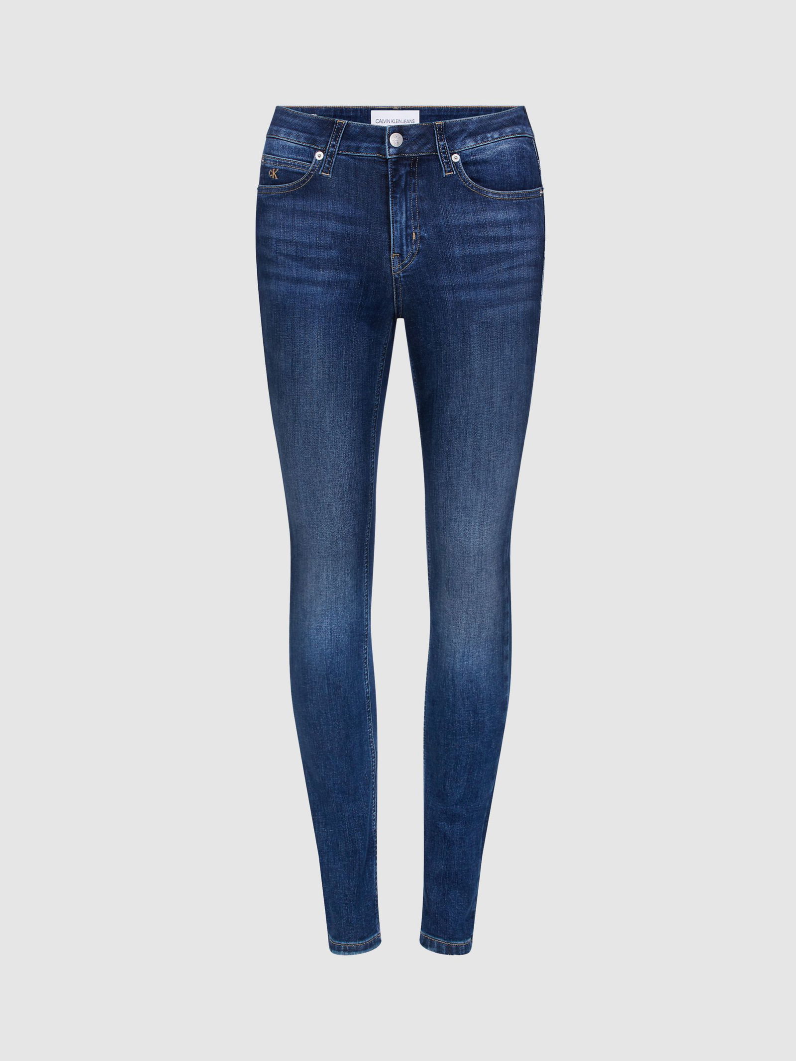 CALVIN KLEIN Mid Rise Monogram Skinny Jeans in Mid Blue