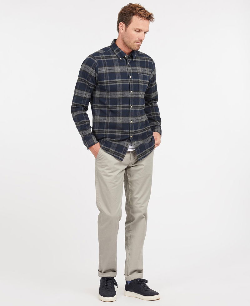 Navy Barbour flannel shirt with a man wearing it.