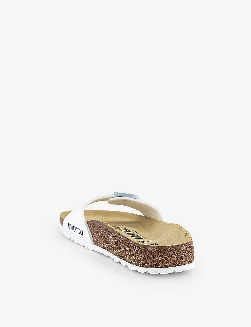 White Birkenstock sandals with cork footbed