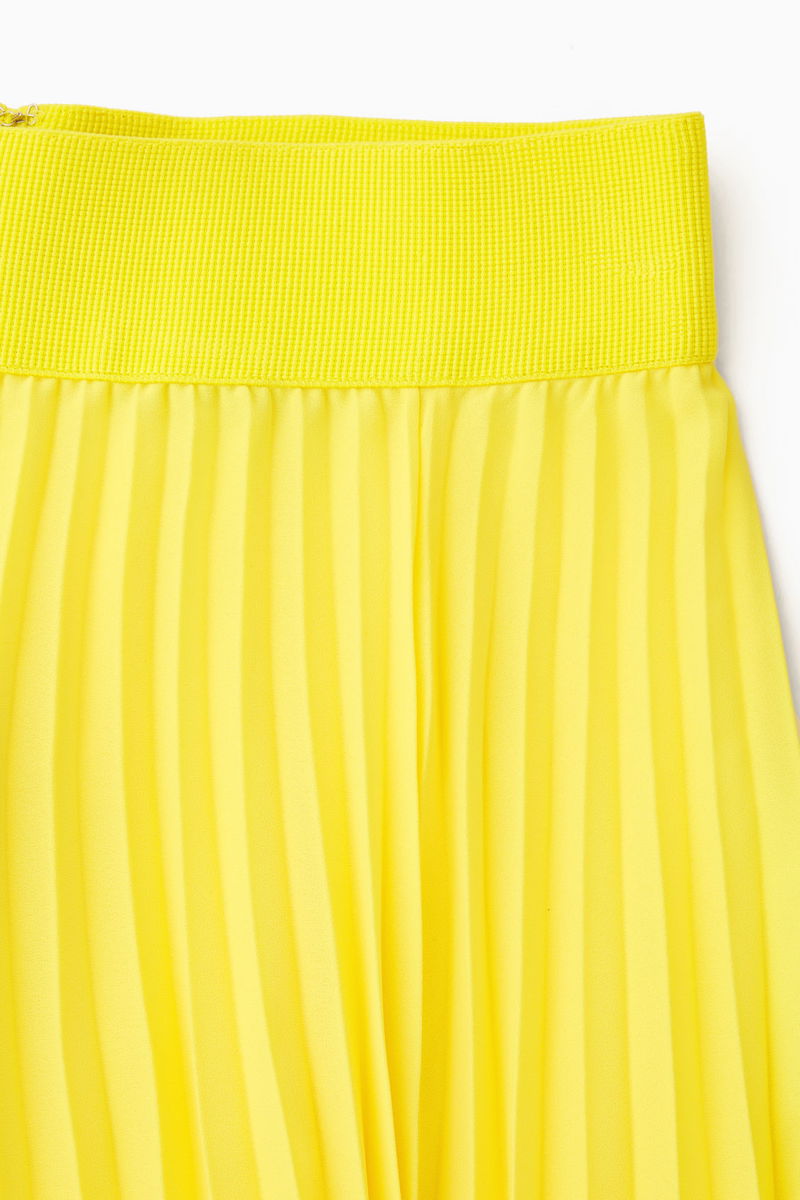 bright yellow pleated skirt