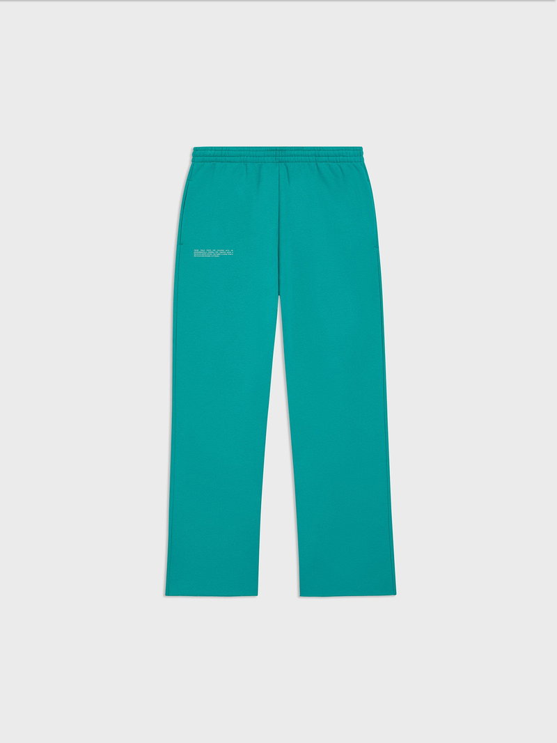 Teal PANGAIA wide-leg sweatpants with a subtle logo.