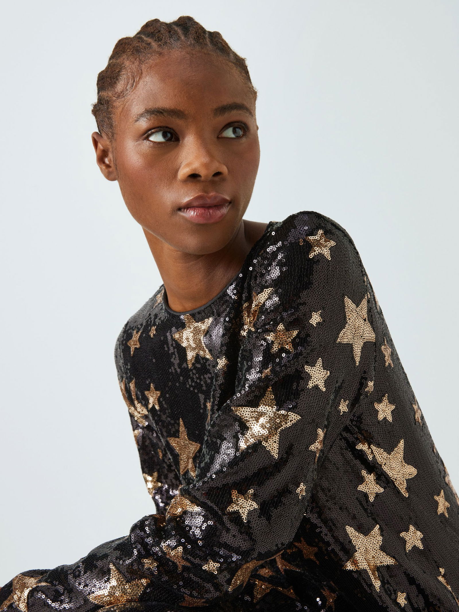 sister jane star sequin dress Embrace the celestial allure of the Super Star Sequin Dress. This loose-fit  midi dress is adorned in a star sequin fabric that shimmers with cosmic  elegance. Fully lined for your comfort, it's