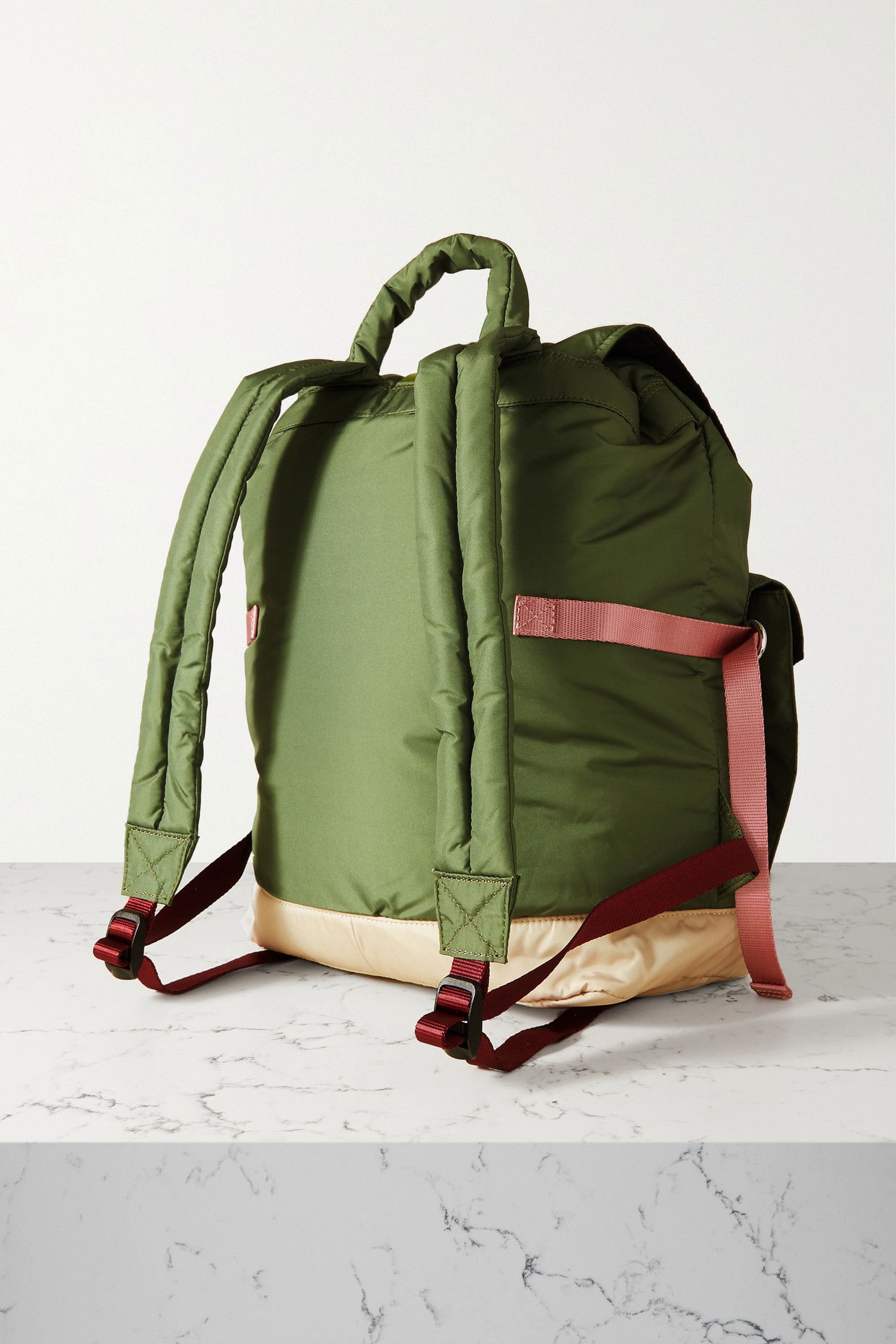 ganni recycled mini backpack TECH The foldover top provides easy access GANNI Pink Small Bucky Backpack
