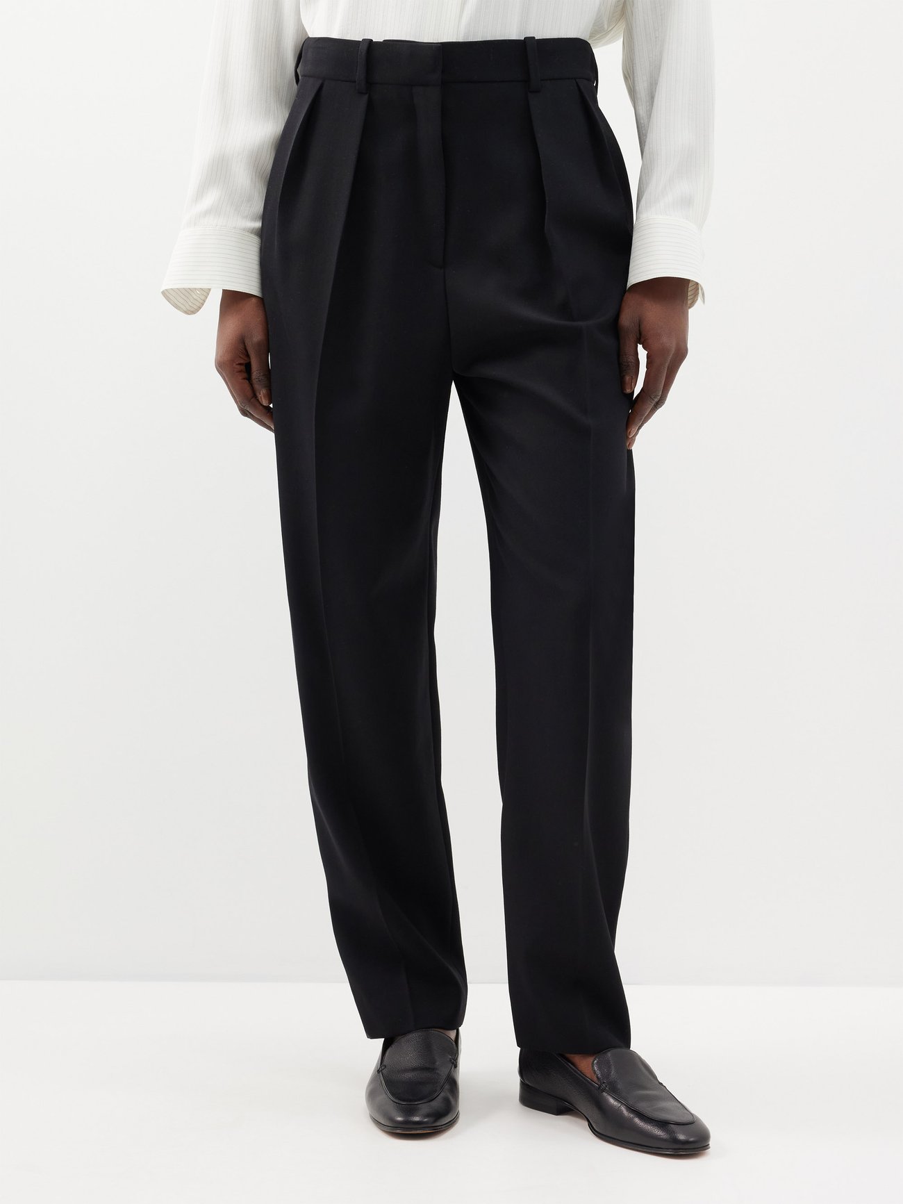 THE ROW Corby Double-Pleated Wool Trousers in Black | Endource