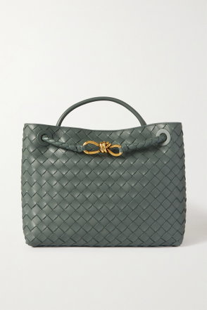 Green woven leather tote bag with a gold clasp handle