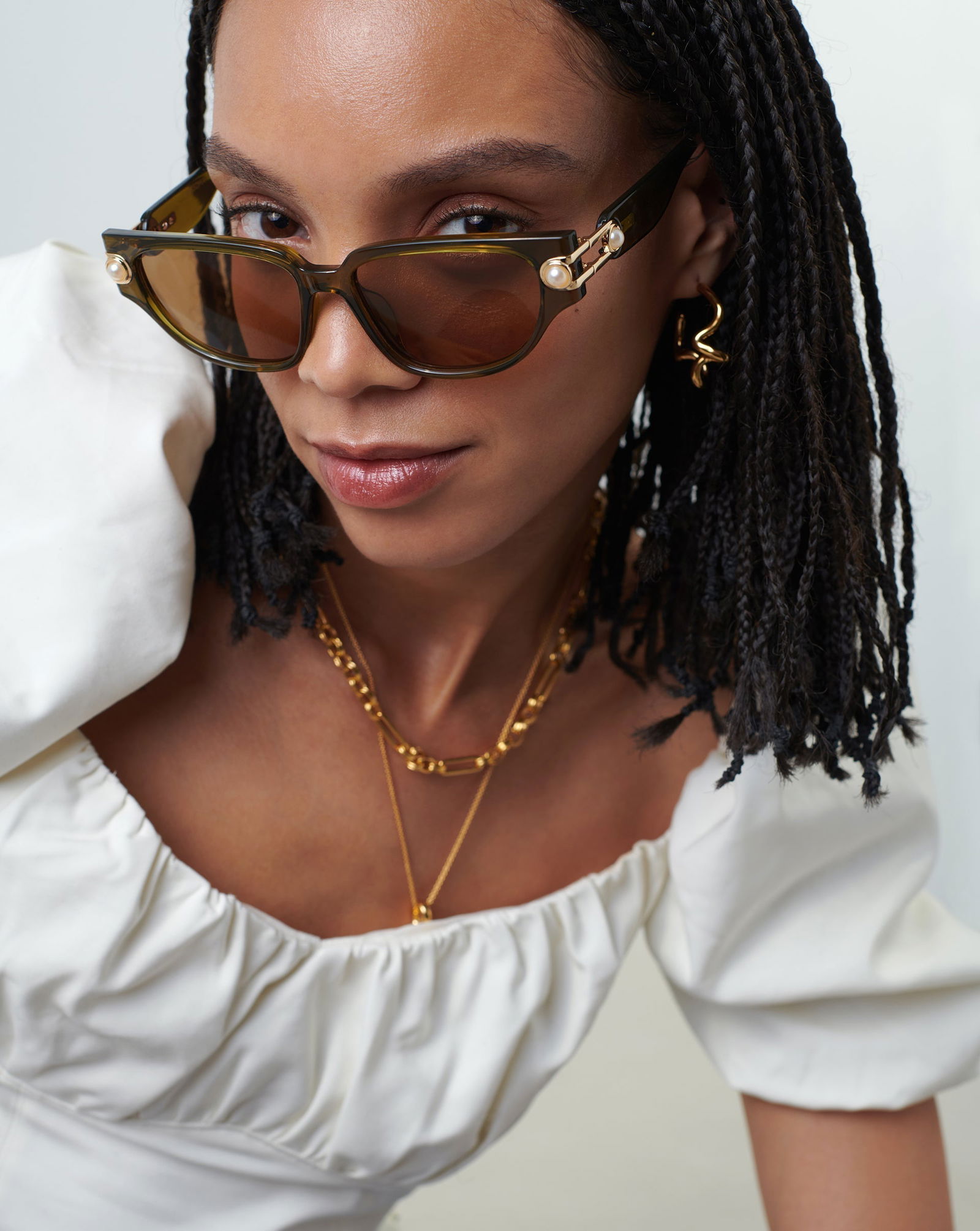 Le Specs x Missoma Serpens Link Olive Green Pearl Accent Sunglasses Missoma and Le Specs announce jewelled sunglasses | Wallpaper* main image 3