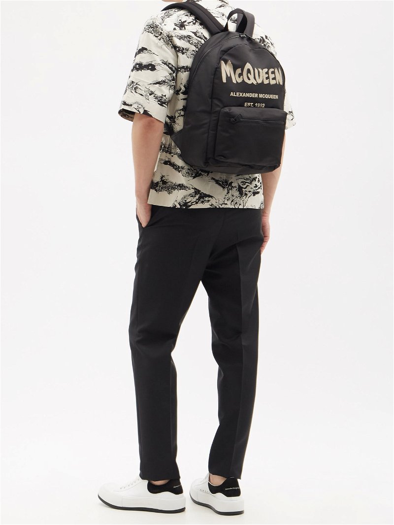 ALEXANDER MCQUEEN Metropolitan Logo-Print Backpack in Black