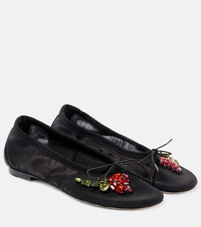 Black ballet flats with red, green, and clear rhinestone embellishment.