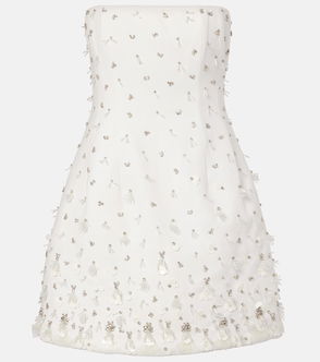 White strapless dress with delicate, fringed embellishments