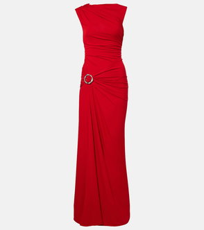 Red maxi dress with draped detailing and belt.