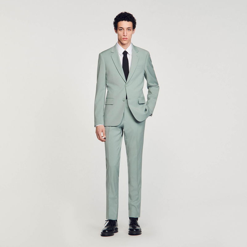 Light green suit and tie ensemble on a model