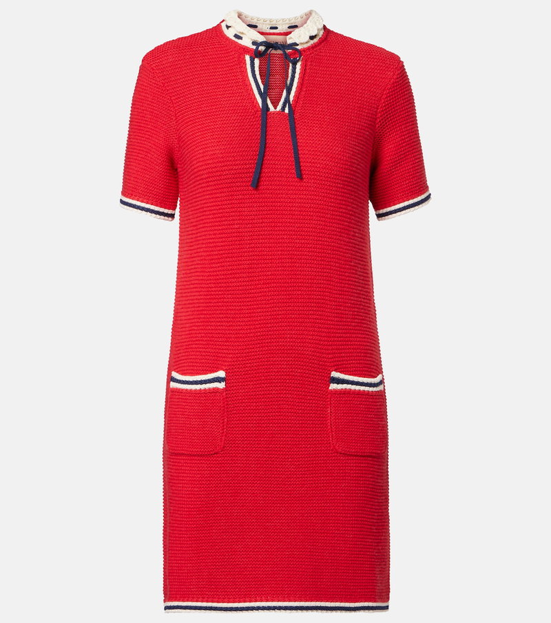 Red knit dress with white trim and blue laces