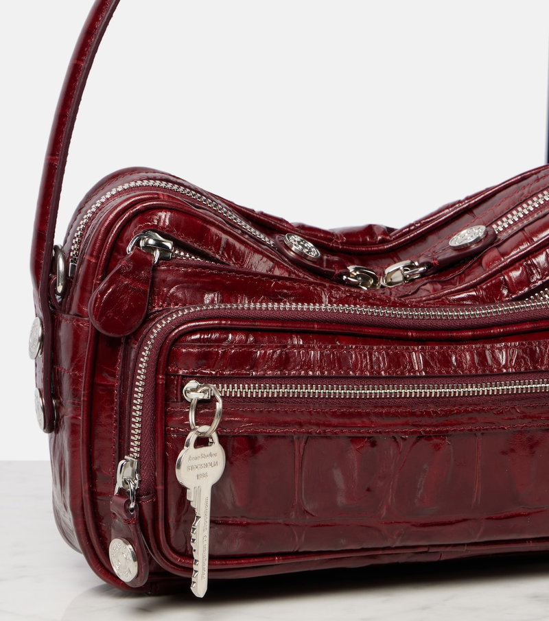 Red crocodile-embossed shoulder bag with silver hardware