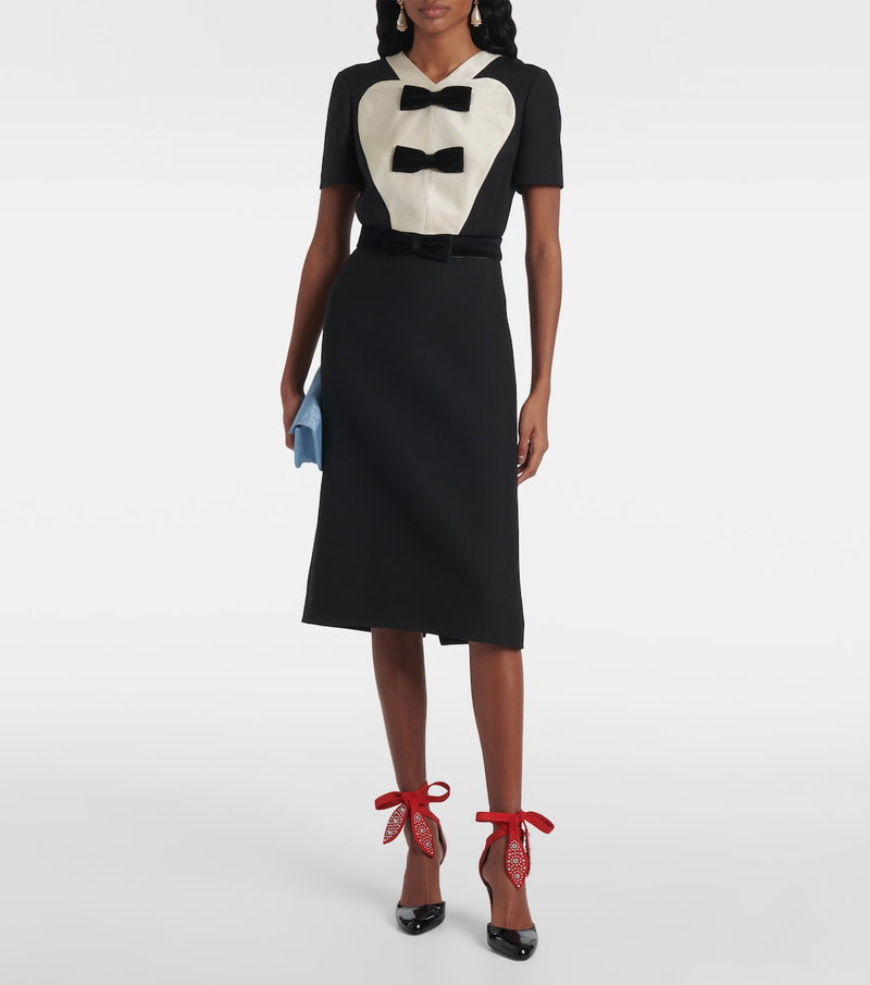 Valentino black and white tuxedo dress with bow details.