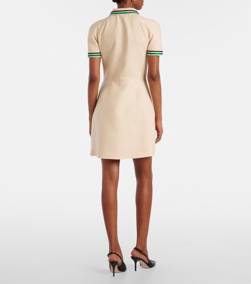 Cream-colored Valentino dress with green and white trim