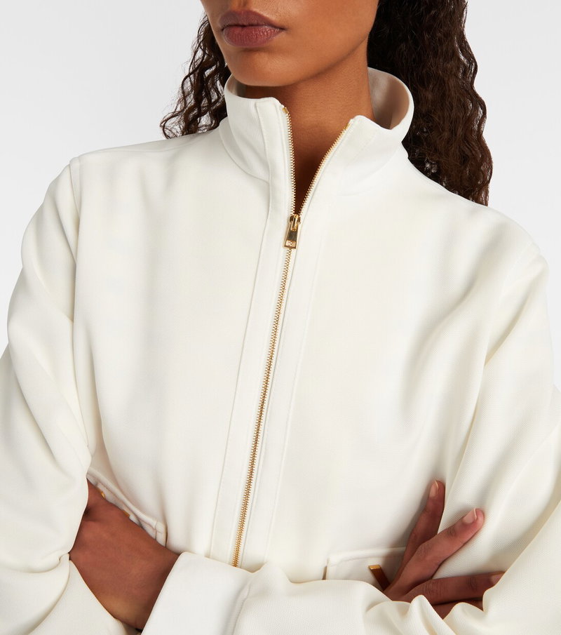 Valentino cream-colored zip-up sweatshirt, close-up.