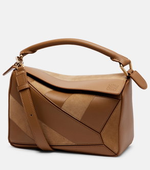 Brown leather Puzzle bag with a handle and strap