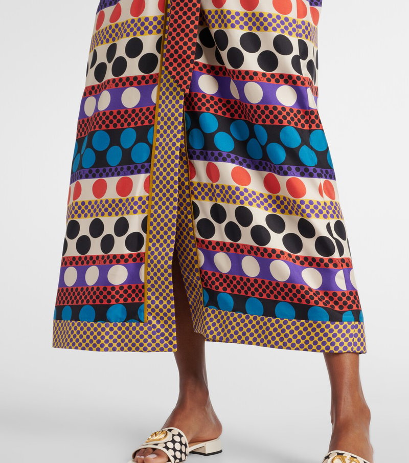 Valentino patterned silk trousers with a bold, colorful polka dot design.
