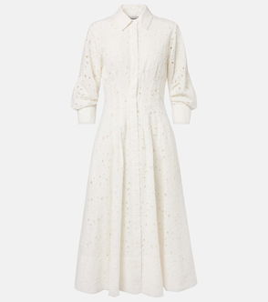 White eyelet dress with long sleeves and button-front.