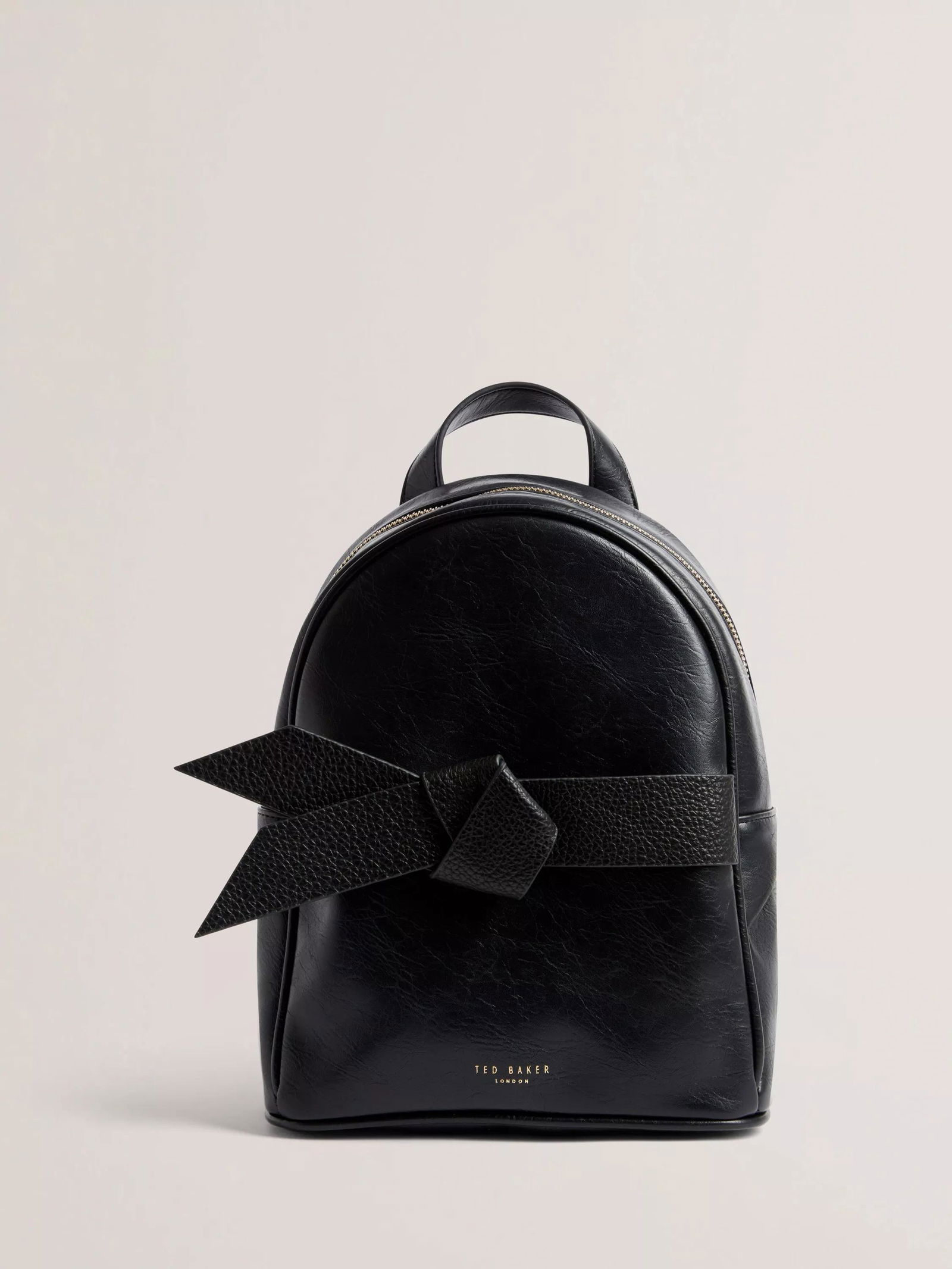 TED BAKER Jimliya Bow Mini Backpack in Black | endource