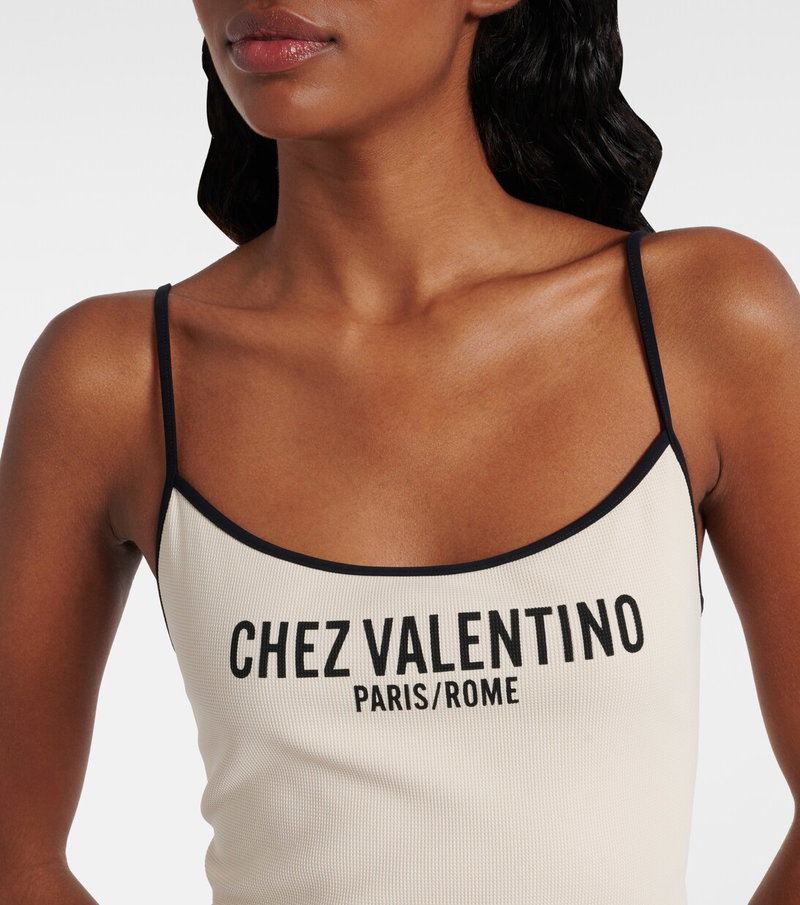 Cream ribbed tank top with black trim and Chez Valentino logo