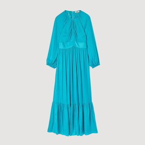 Turquoise satin maxi dress with gathered sleeves and ruffles.
