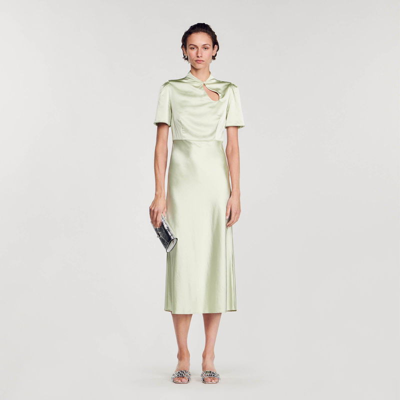 Pale green satin midi dress with a keyhole back.