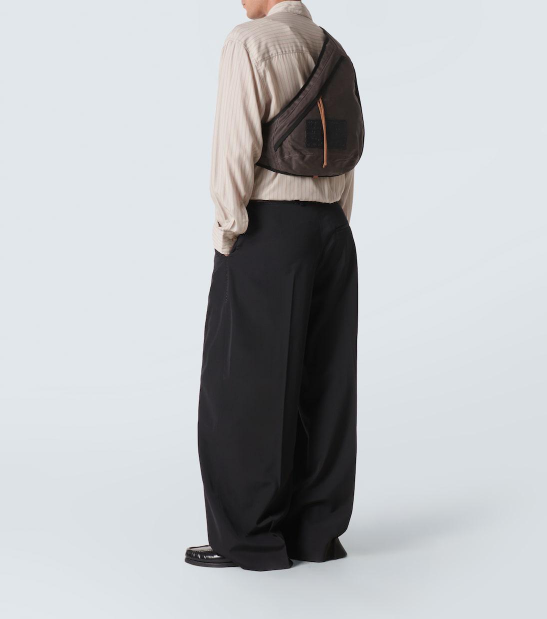 ACNE STUDIOS Sling Leather-Trimmed Canvas Backpack | endource ACNE STUDIOS Sling Leather-Trimmed Canvas Backpack | endource