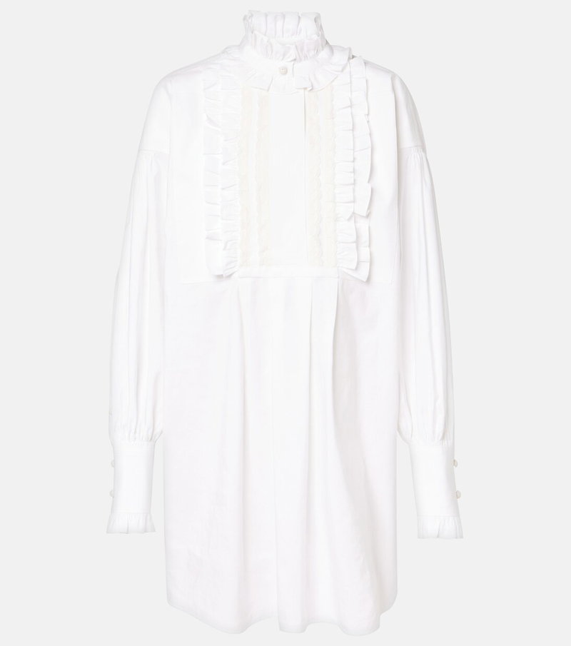 White Valentino blouse with ruffled detailing and bishop sleeves.