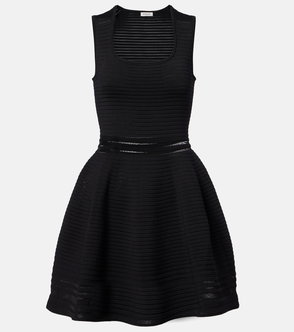 Black ribbed knit dress with flared skirt