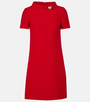 Red crepe dress with a gold heart embellishment