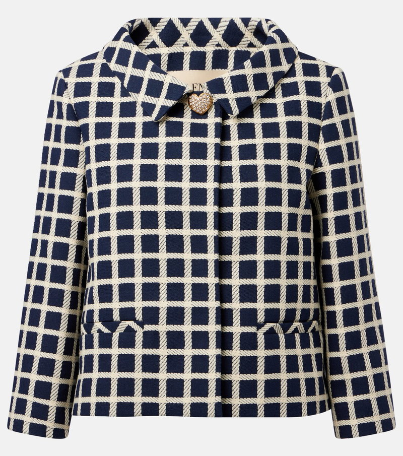 Navy and white rope-textured blazer with a jewel-embellished button.