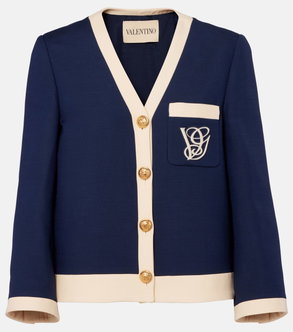 Navy and cream blazer with gold buttons and a monogram pocket