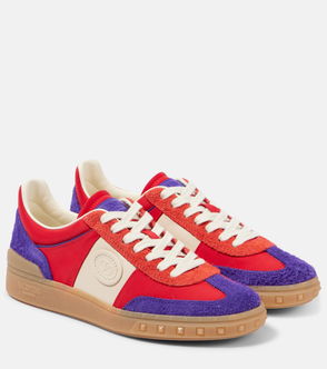 Valentino Garavani sneakers in red and purple suede with white laces.