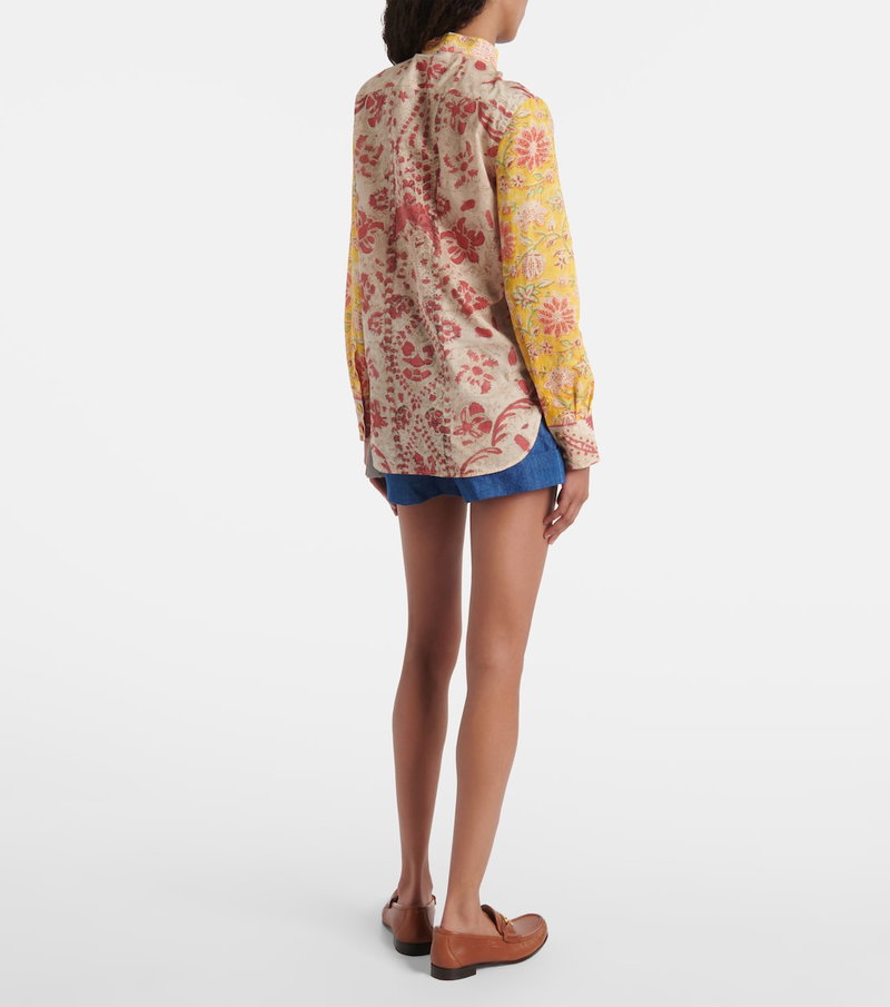Valentino floral blouse with denim shorts