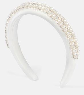 White headband adorned with pearls and crystals.