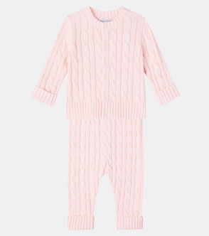 Pink cable-knit cardigan and pants set for baby.