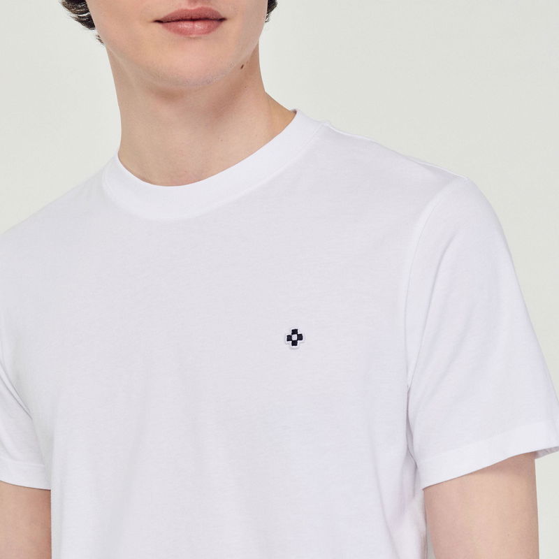 SANDRO white t-shirt with embroidered black cross.