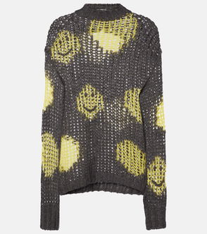 Grey and yellow knitted sweater with embroidered smiley faces.